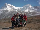 12 17 Gerhardt, Rajin, Jerome Ryan, Tashi, Ram, Chris, Jan, Ben And Shane With Chomolonzo and Makalu From Near Everest East Base Camp In Tibet After about two hours the clouds started to cover Everests face, so the four of us decided to head back. We walked to the British Camp and were surprised to meet Shane, Jan, Ben, Rajin, and Tashi sitting and talking to the British Camp Nepalese. We took another team photo: Gerhardt, Rajin, Jerome Ryan, Tashi, Ram, Chris, Jan, Ben and Shane with Chomolonzo and Makalu behind.
